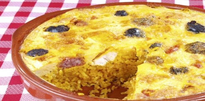 طريقة عمل طاجن أرز بالسجق في الفرن