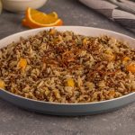 طريقة عمل مجدرة الأرز مع المشمش المجفف والبرتقال