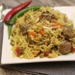 طريقة عمل أرز بكرات اللحم والطماطم