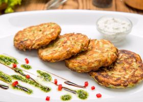 طريقة عمل أقراص الكوسا المقلية بالبقسماط