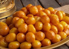 طريقة عمل اللقيمات بالزعفران والبرتقال