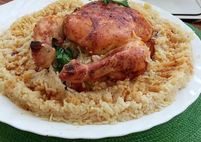 طريقة عمل دجاج مع الأرز محمر في الفرن