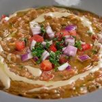 طريقة عمل الفول بالطماطم والبصل