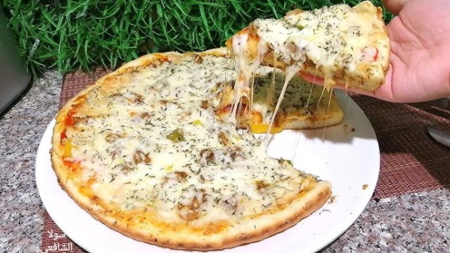 طريقة عمل البيتزا بصوص البشاميل