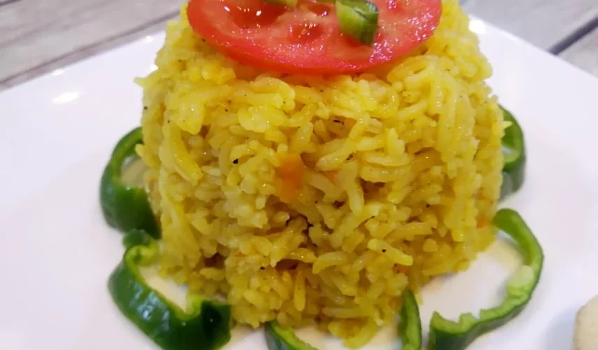 طريقة عمل ارز بالكركم وجوز الهند والأناناس