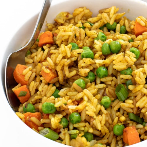 طريقة عمل ارز بالكارى والخضار الشتوى بصوص الزبدة والثوم