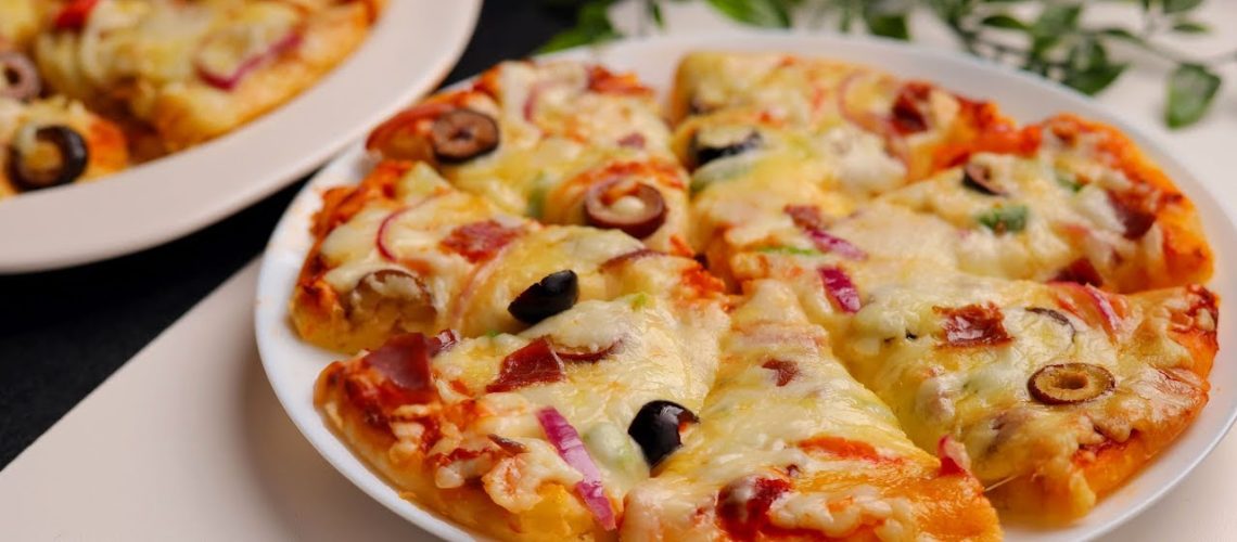 طريقة عمل بيتزا عربية بعجينة السمبوسك السريعة